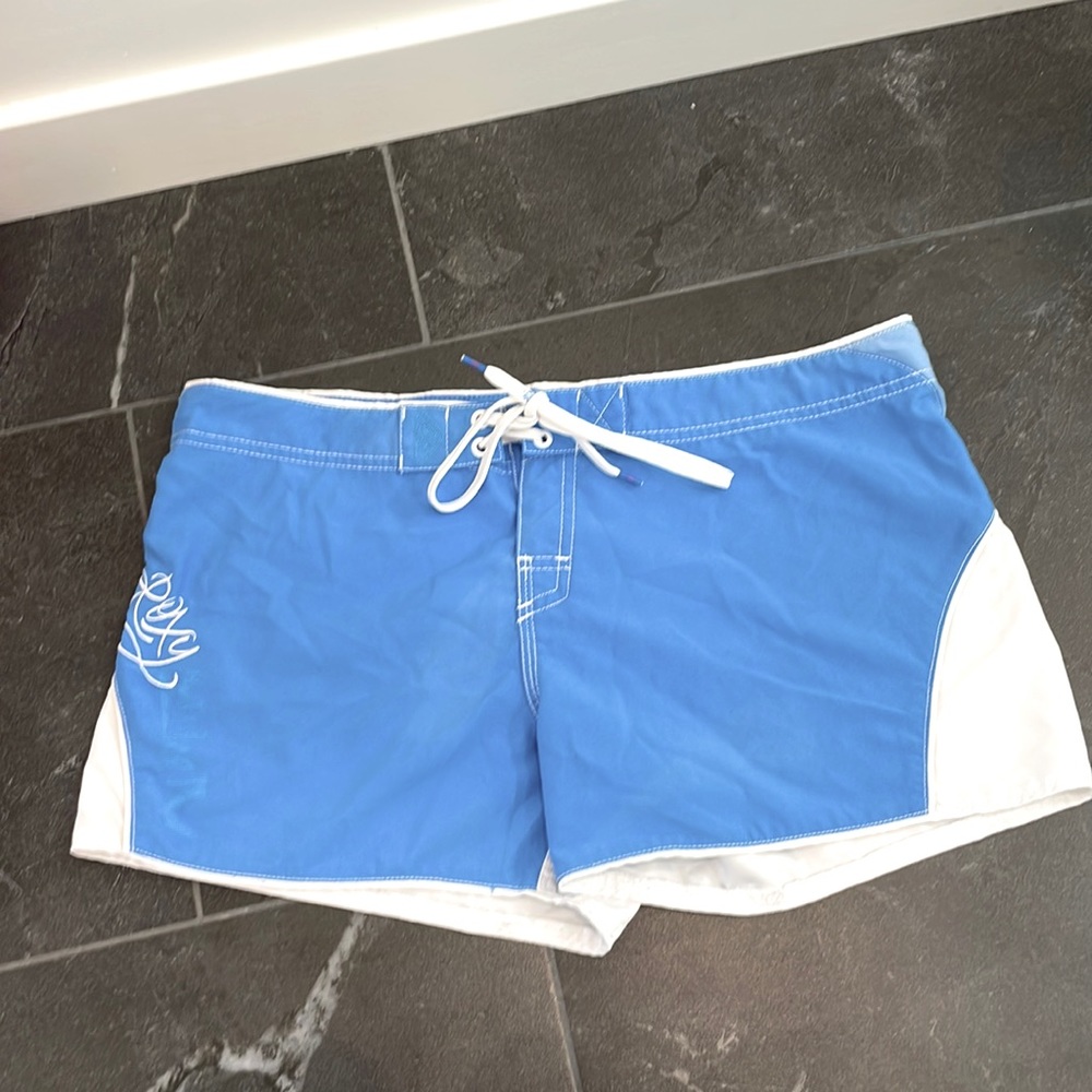 Roxy Quiksilver blue and white board shorts juniors size 9.